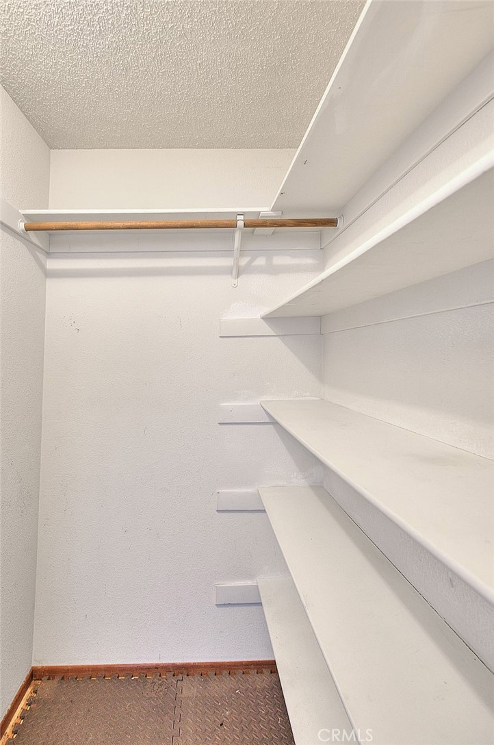 14811 Kingsdale Road Apple Valley, CA 92307 - Photo 22 of 57 a view of an empty walk in closet