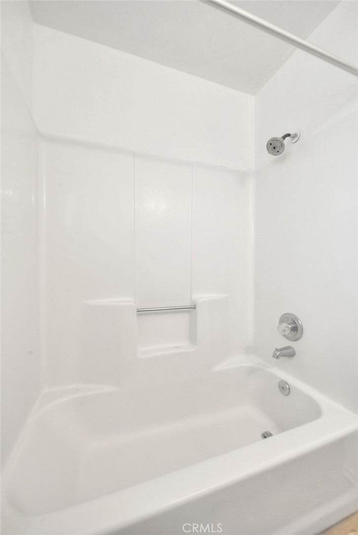 14811 Kingsdale Road Apple Valley, CA 92307 - Photo 28 of 57 a close up of a bathtub