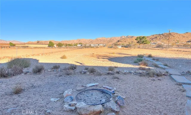 a view of a road with an ocean view