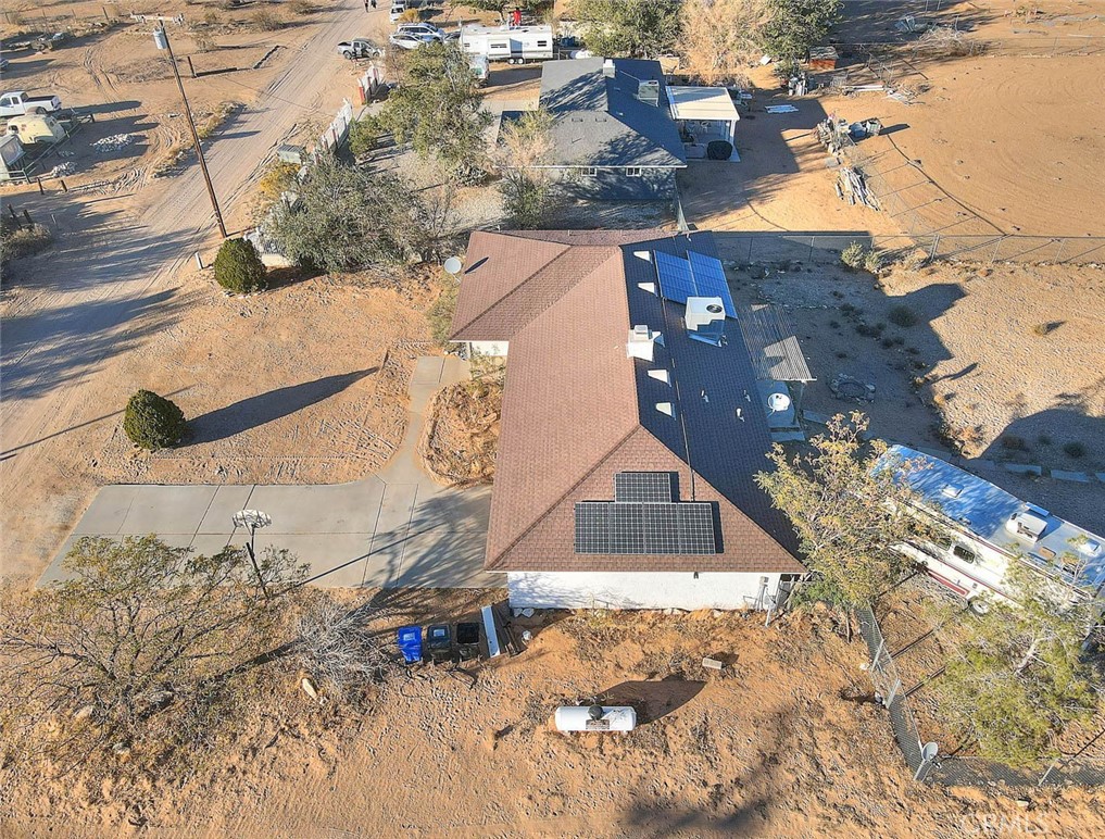 14811 Kingsdale Road Apple Valley, CA 92307 - Photo 49 of 57 an aerial view of a house with a yard