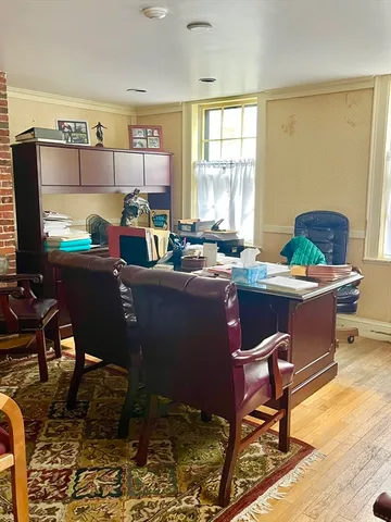 a room with furniture a window and a table