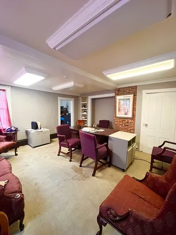 a bedroom with furniture or couch and a window