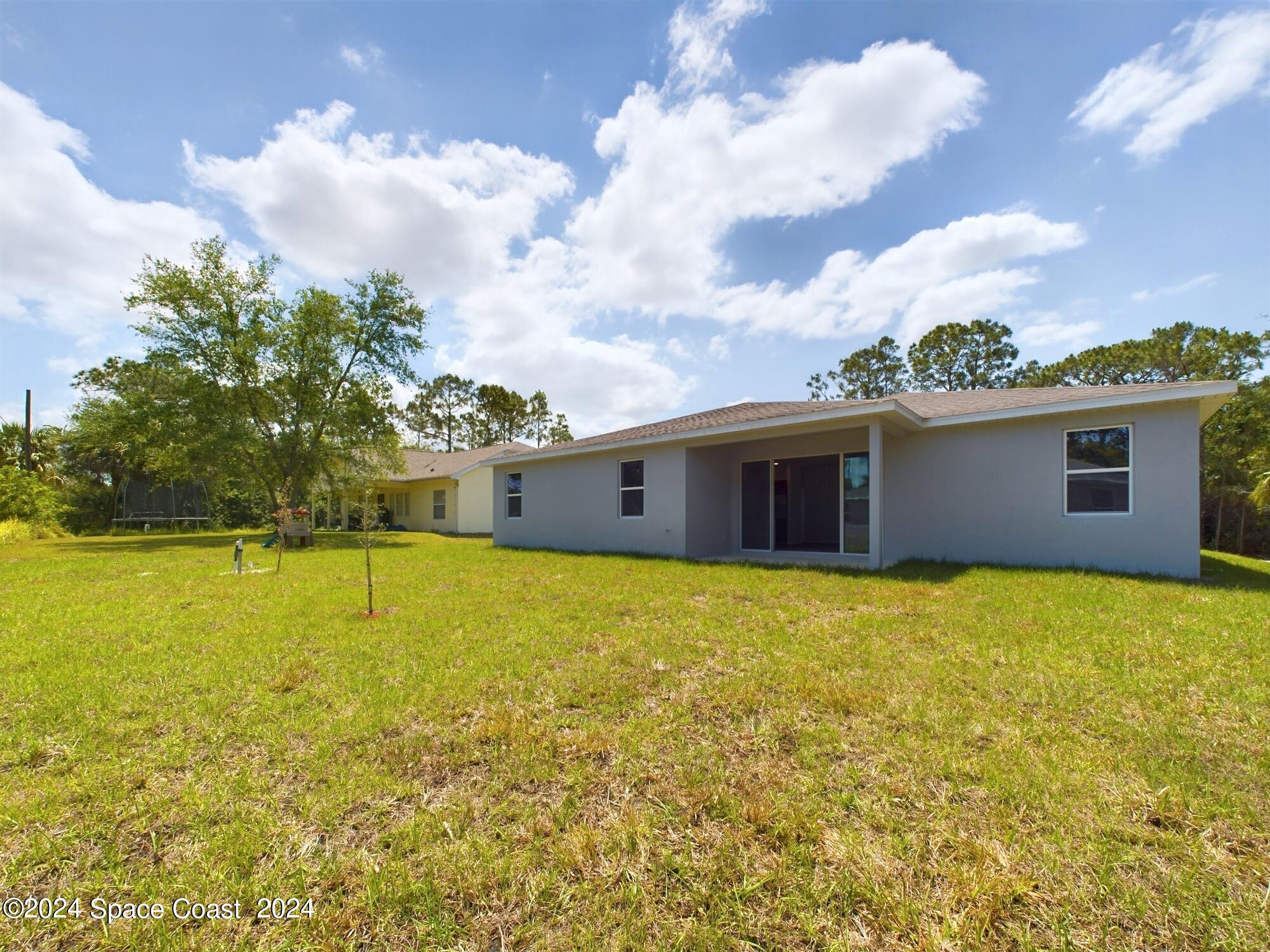 409 Firebrand Street Palm Bay, FL 32908 - Photo 4 of 12 CAM03399G0-PR0025-STILL010