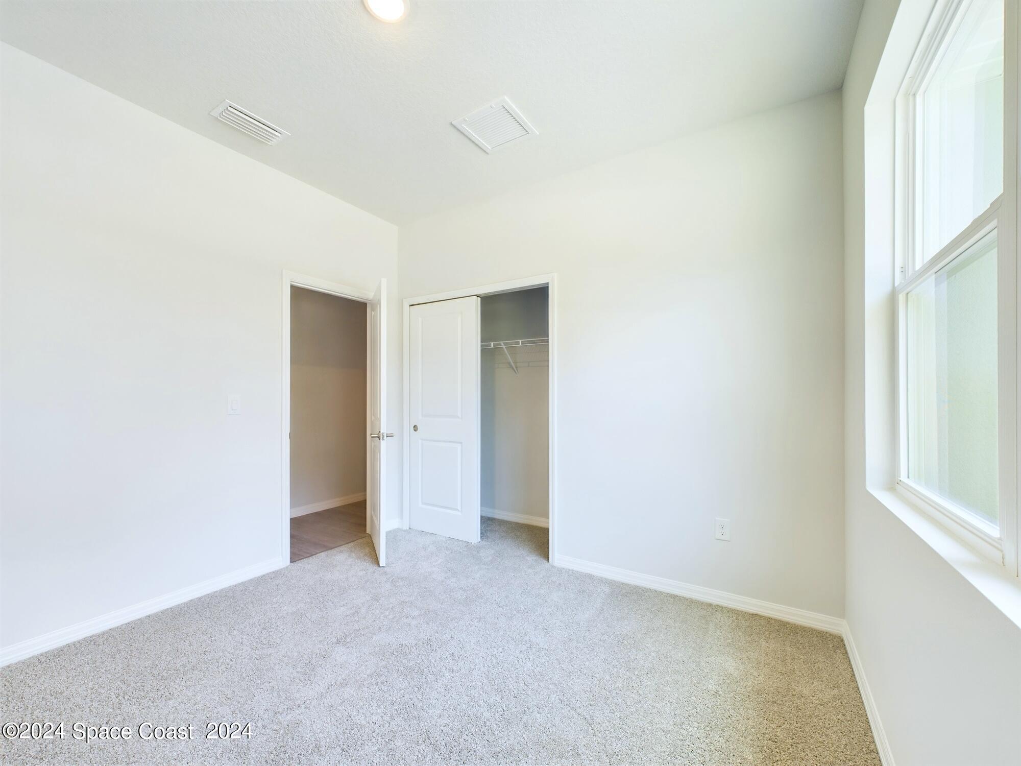 409 Firebrand Street Palm Bay, FL 32908 - Photo 7 of 12 CAM03399G0-PR0025-STILL026