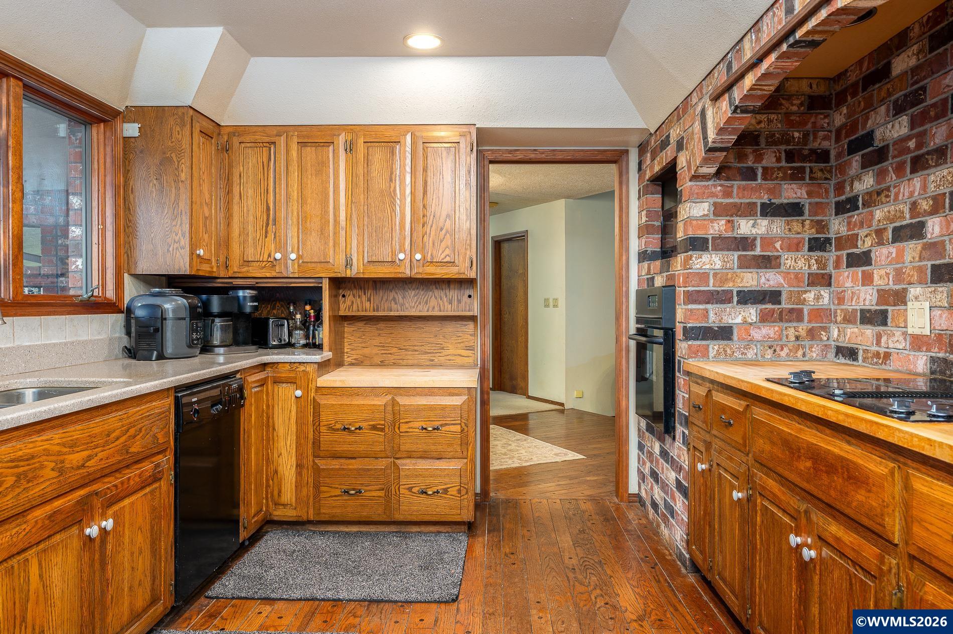 27572 South Kinzy Road Estacada, OR 97023 - Photo 16 of 50 a kitchen with stainless steel appliances granite countertop a stove a sink and a refrigerator