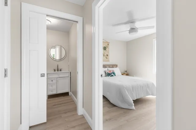 a en suite bathroom with a sink and a mirror