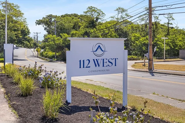 a sign on the side of a road