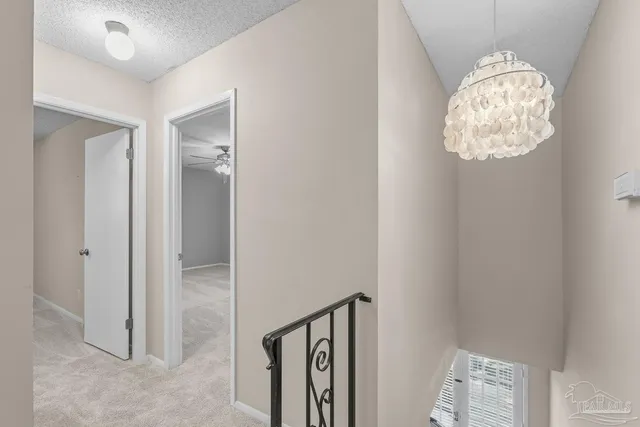 a view of a bathroom from the hallway