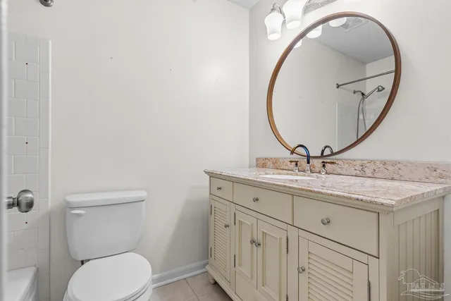 a bathroom with a bathtub and a toilet