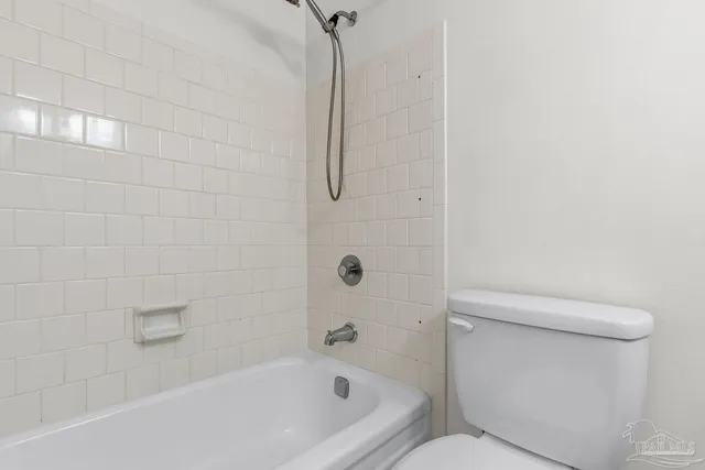 a view of a backyard with a small swimming pool