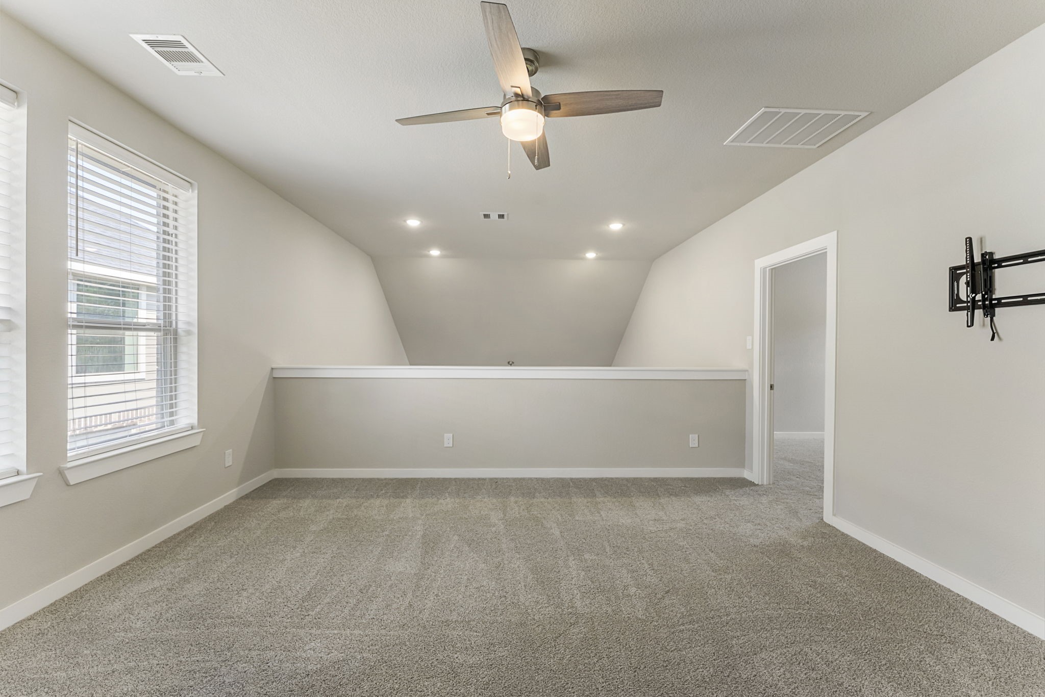 421 Soapberry Tree Court Conroe, TX 77318 - Photo 32 of 50 a view of an empty room with a window
