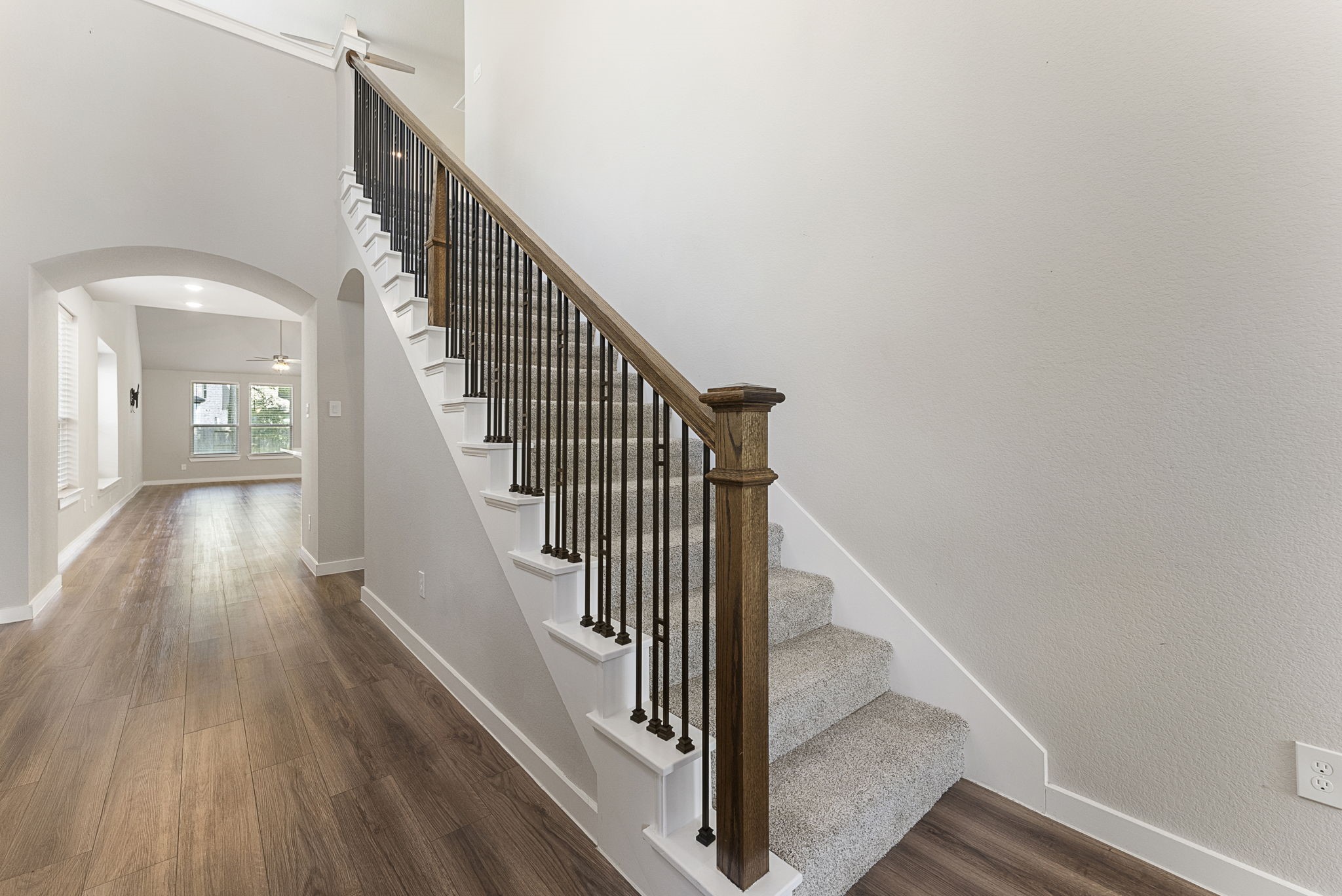 421 Soapberry Tree Court Conroe, TX 77318 - Photo 4 of 50 a view of entryway and hall with wooden floor