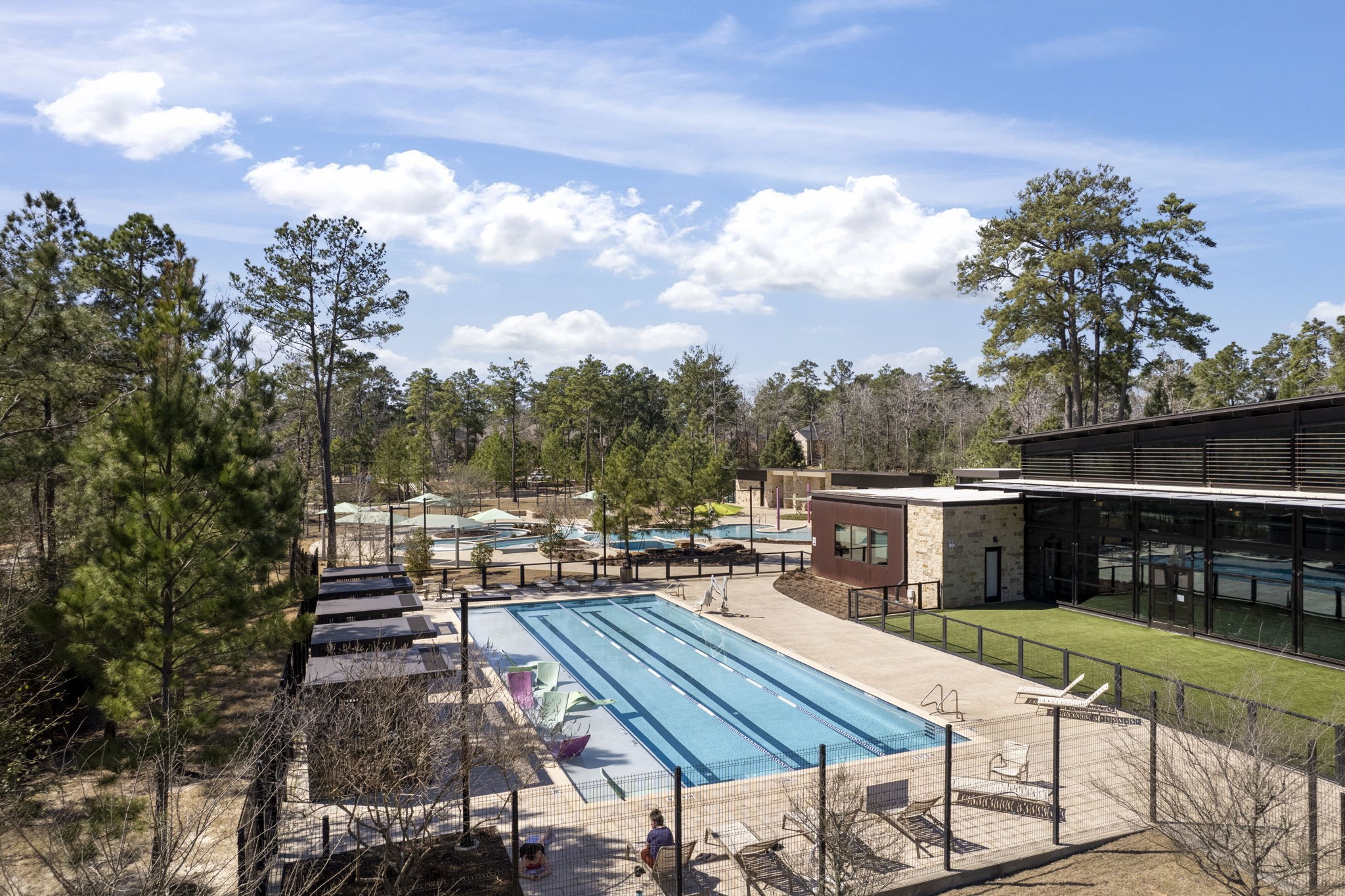 421 Soapberry Tree Court Conroe, TX 77318 - Photo 46 of 50 a view of house with swimming pool outdoor seating