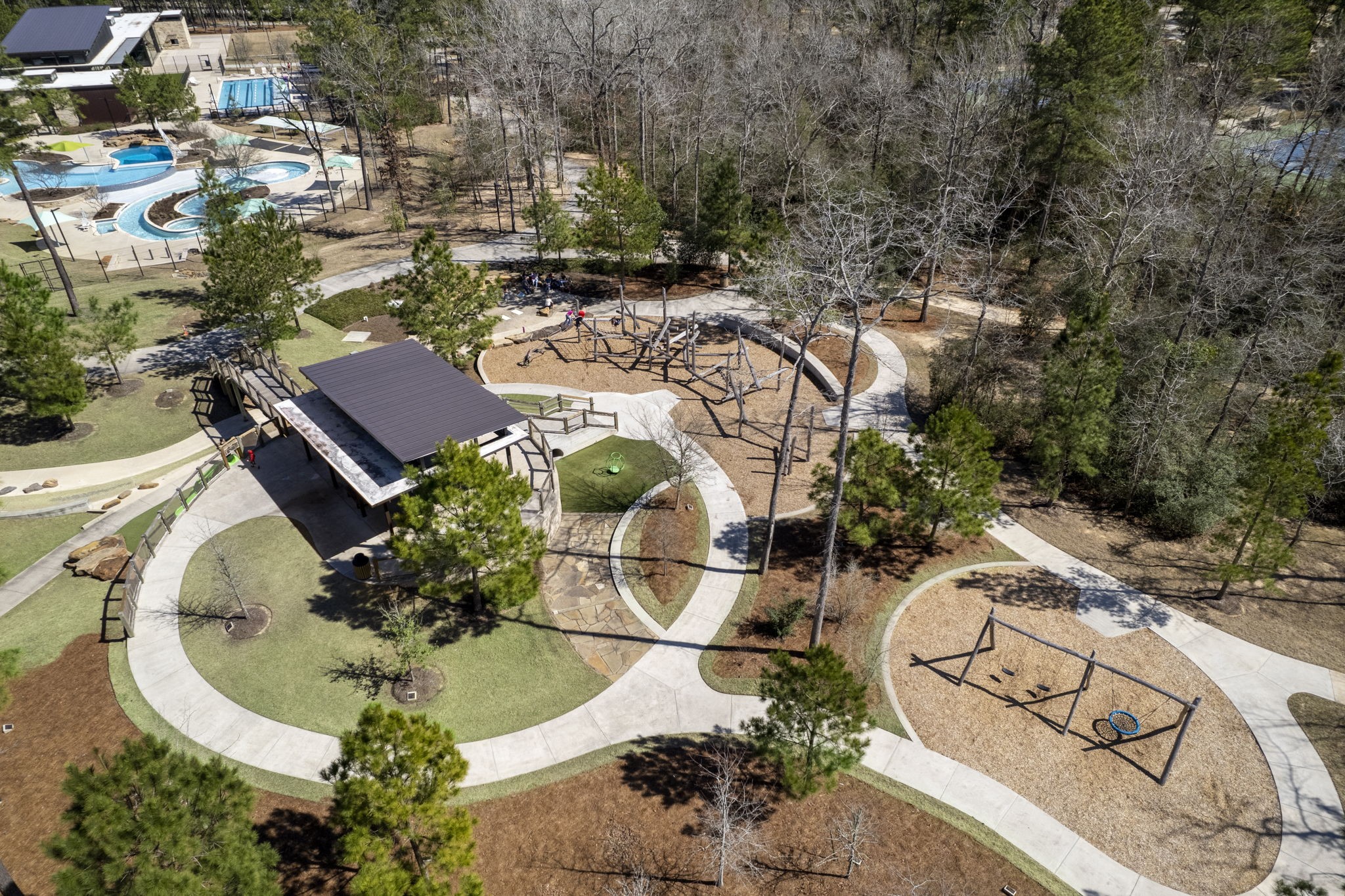 421 Soapberry Tree Court Conroe, TX 77318 - Photo 48 of 50 an aerial view of a swimming pool