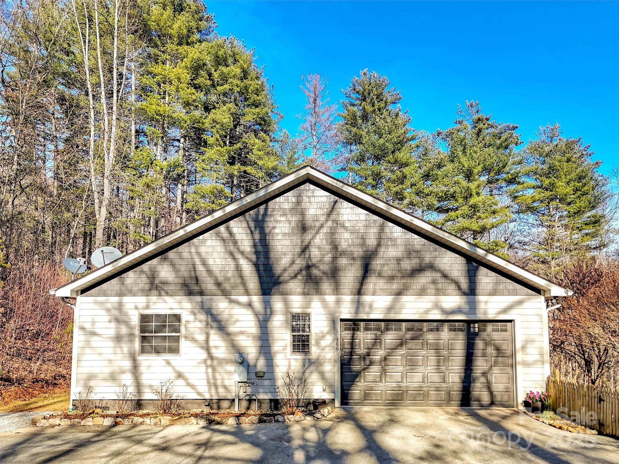 166 Amaroo Ridge, Unit 5 6 Sylva, NC 28779 - Photo 14 of 48 a red and white building with a outdoor space