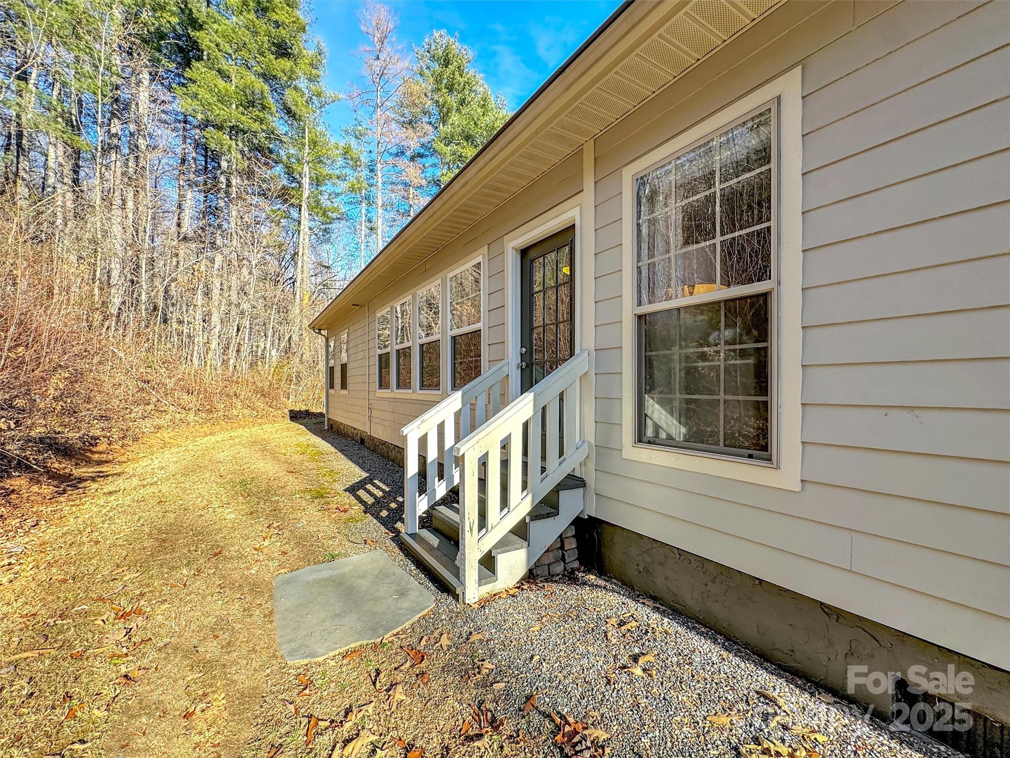 166 Amaroo Ridge, Unit 5 6 Sylva, NC 28779 - Photo 16 of 48 a view of a house with a yard