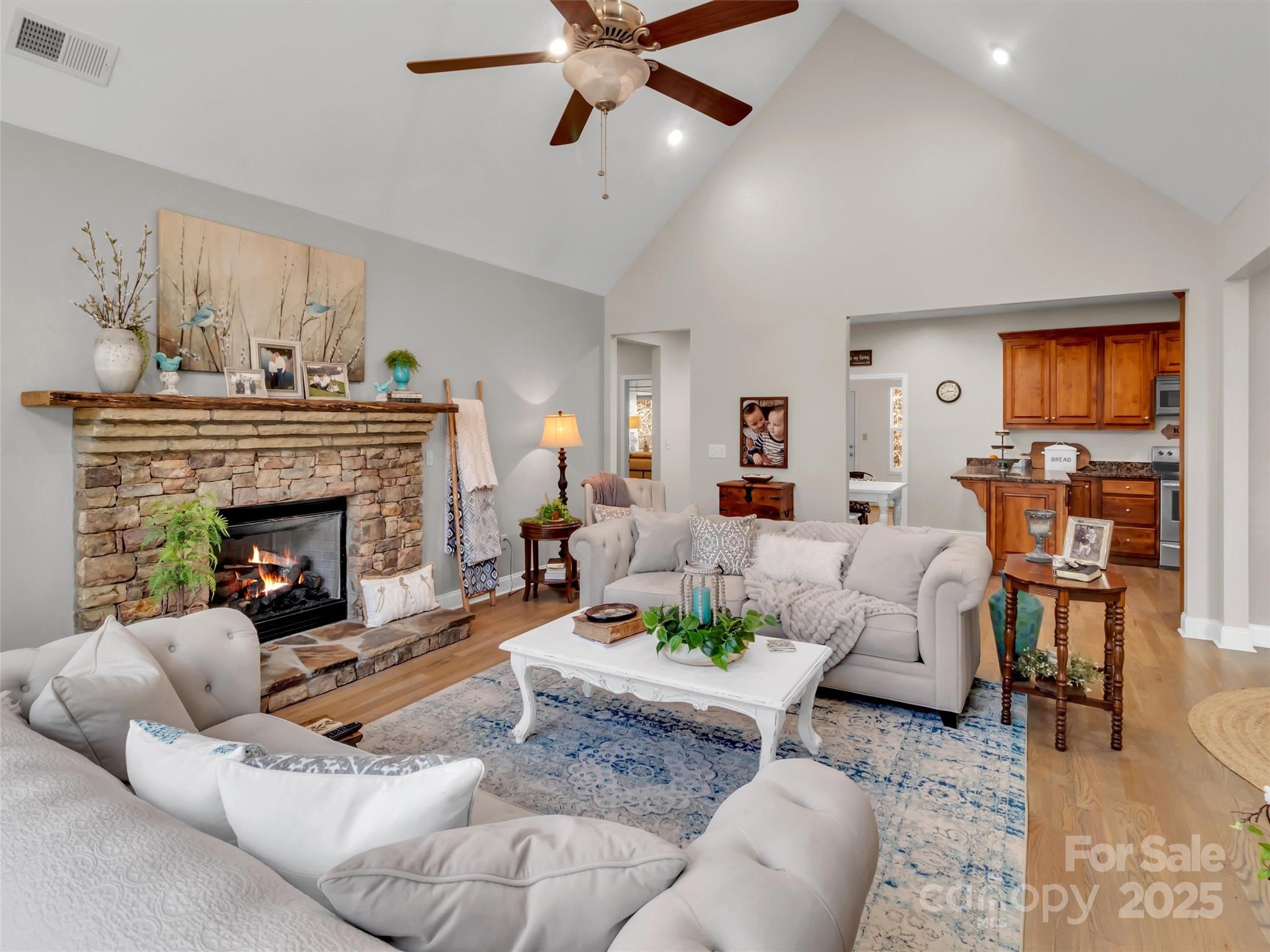 166 Amaroo Ridge, Unit 5 6 Sylva, NC 28779 - Photo 20 of 48 a living room with furniture and a fireplace