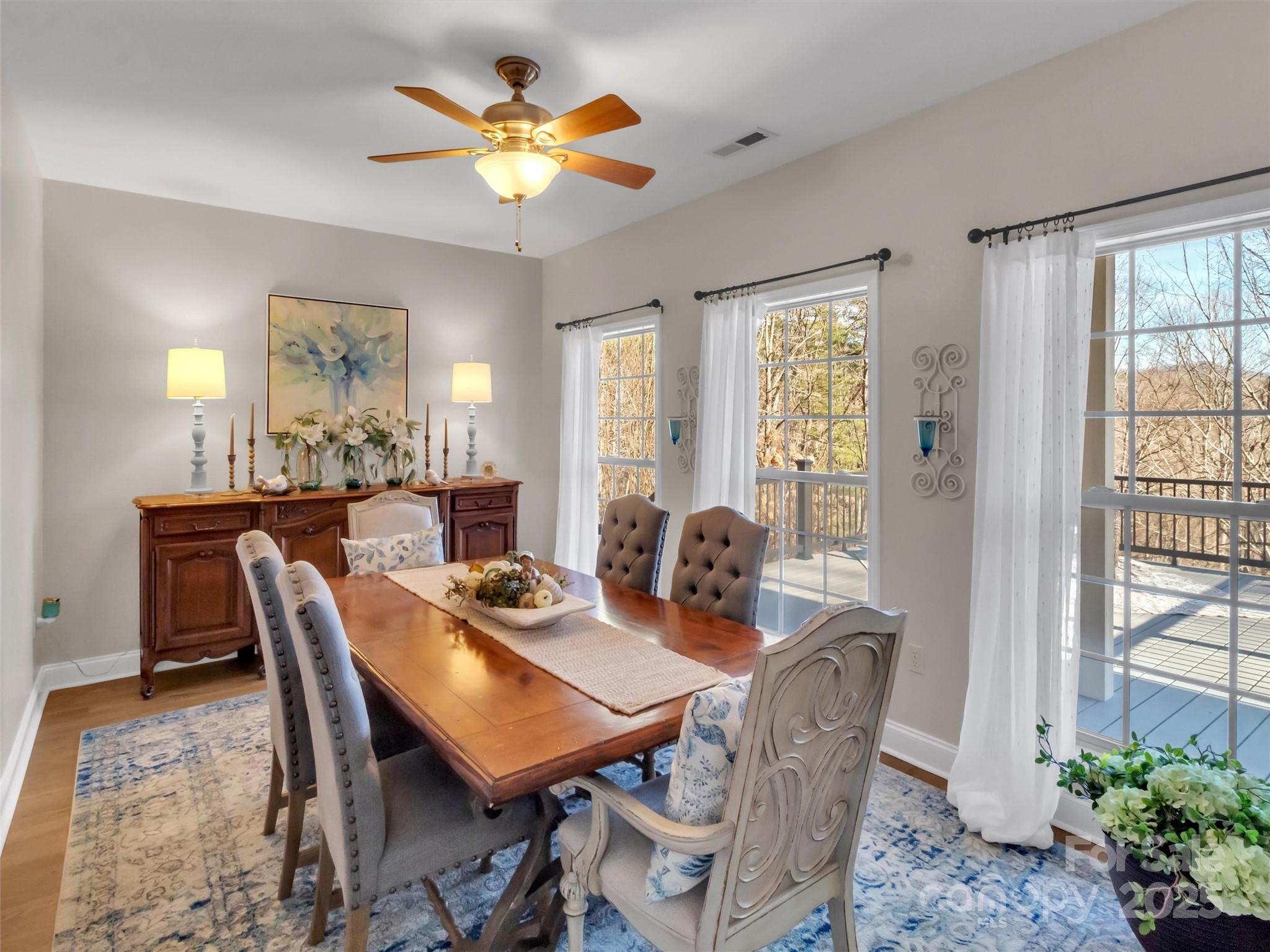 166 Amaroo Ridge, Unit 5 6 Sylva, NC 28779 - Photo 24 of 48 a view of a dining room with furniture window and outside view