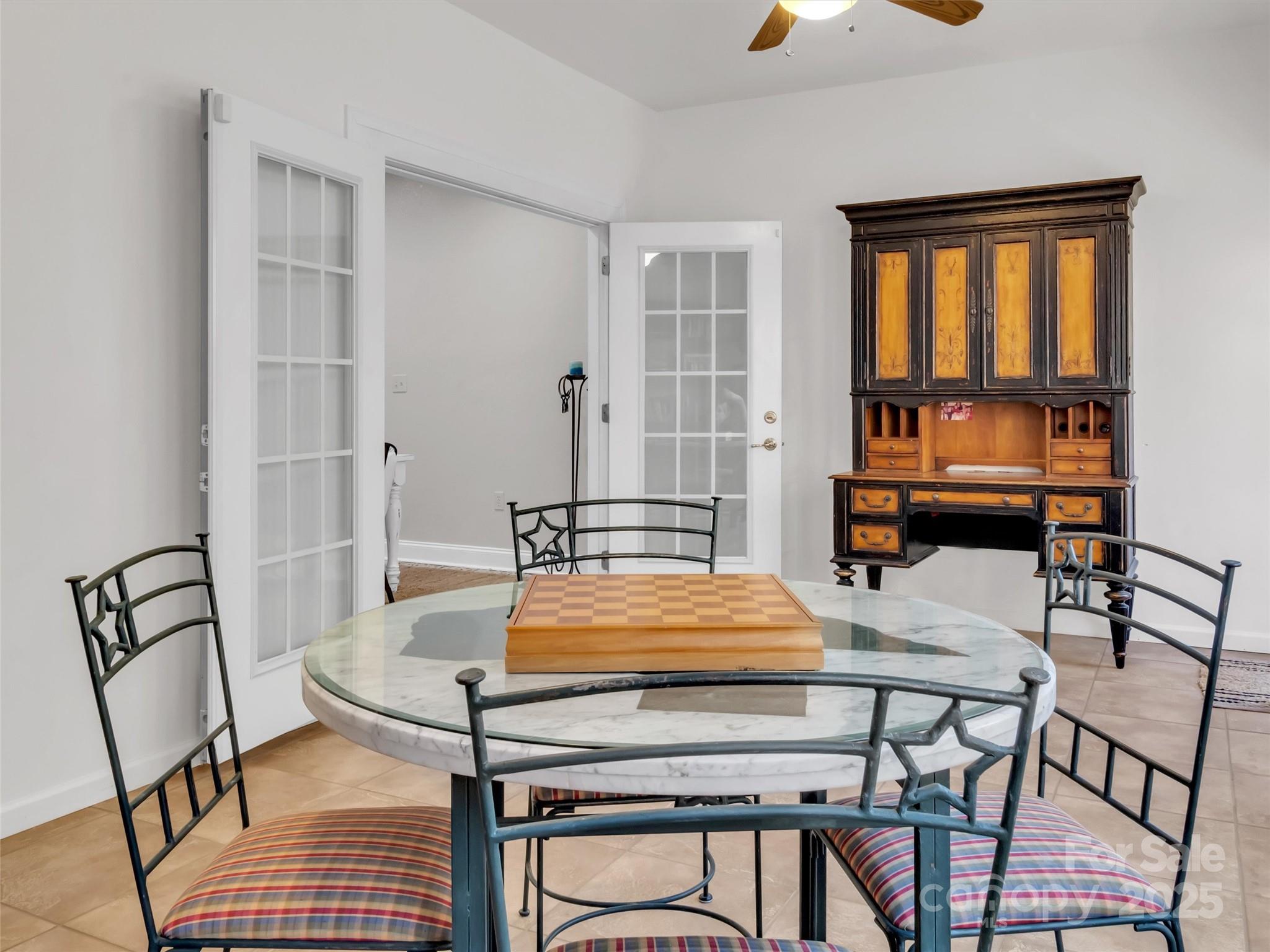 166 Amaroo Ridge, Unit 5 6 Sylva, NC 28779 - Photo 31 of 48 a dining room with furniture and window