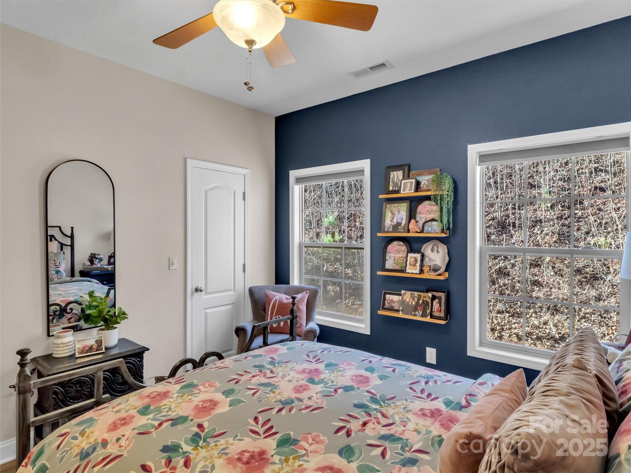 166 Amaroo Ridge, Unit 5 6 Sylva, NC 28779 - Photo 38 of 48 a bedroom with a bed dresser and a window