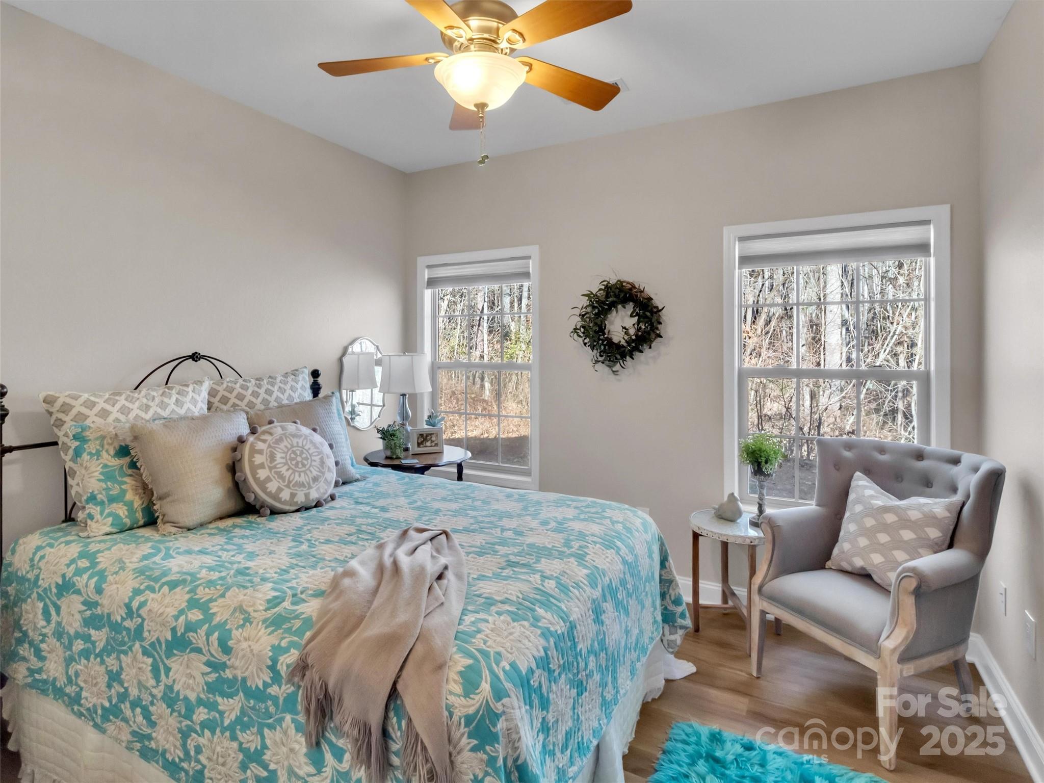 166 Amaroo Ridge, Unit 5 6 Sylva, NC 28779 - Photo 39 of 48 a bedroom with a bed and a large window