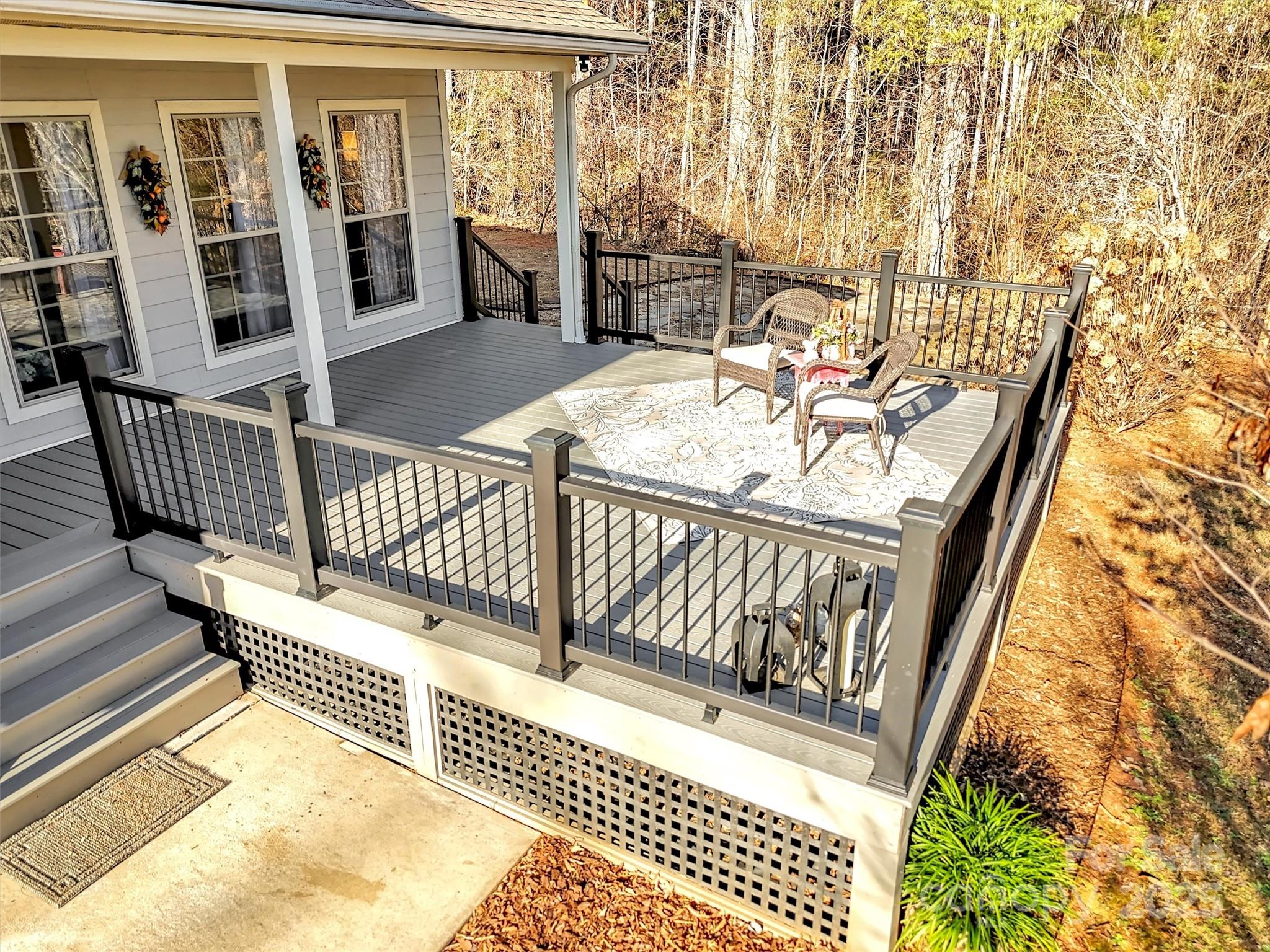 166 Amaroo Ridge, Unit 5 6 Sylva, NC 28779 - Photo 5 of 48 a view of balcony with furniture