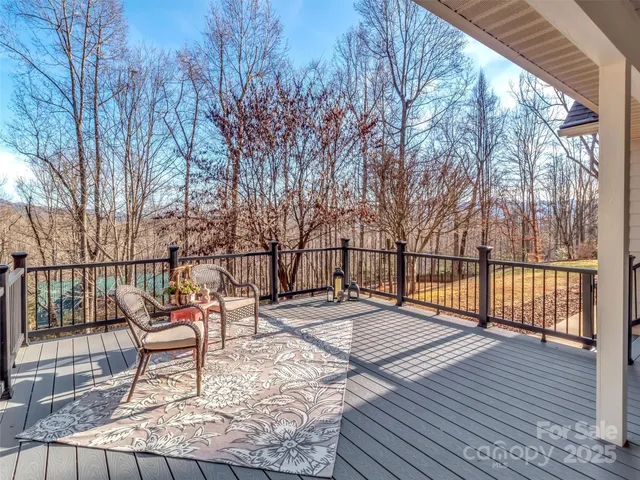 a deck view with a bench and wooden floor