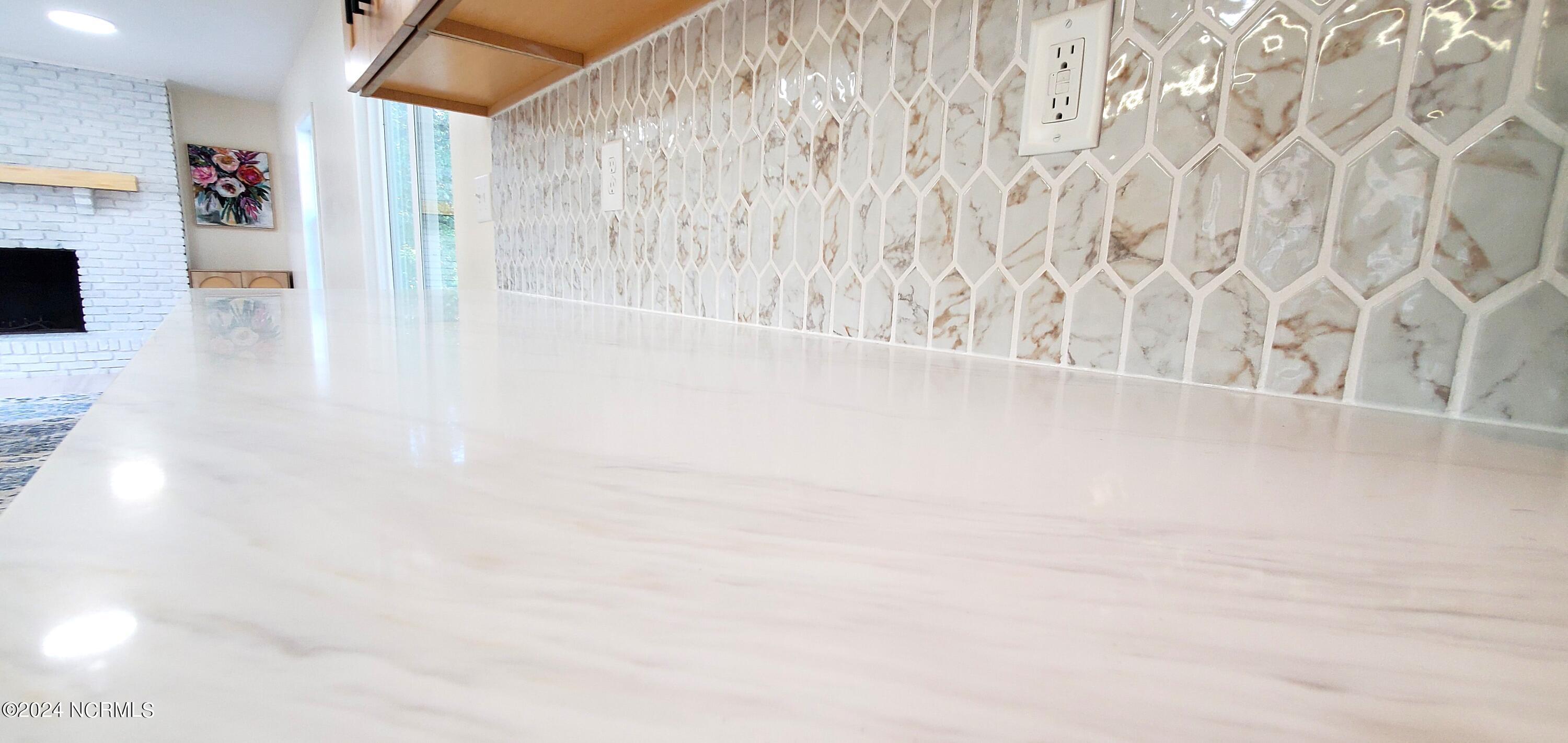 502 Sandy Point Road New Bern, NC 28560 - Photo 39 of 59 Sandstone Counter and Tile Backsplash