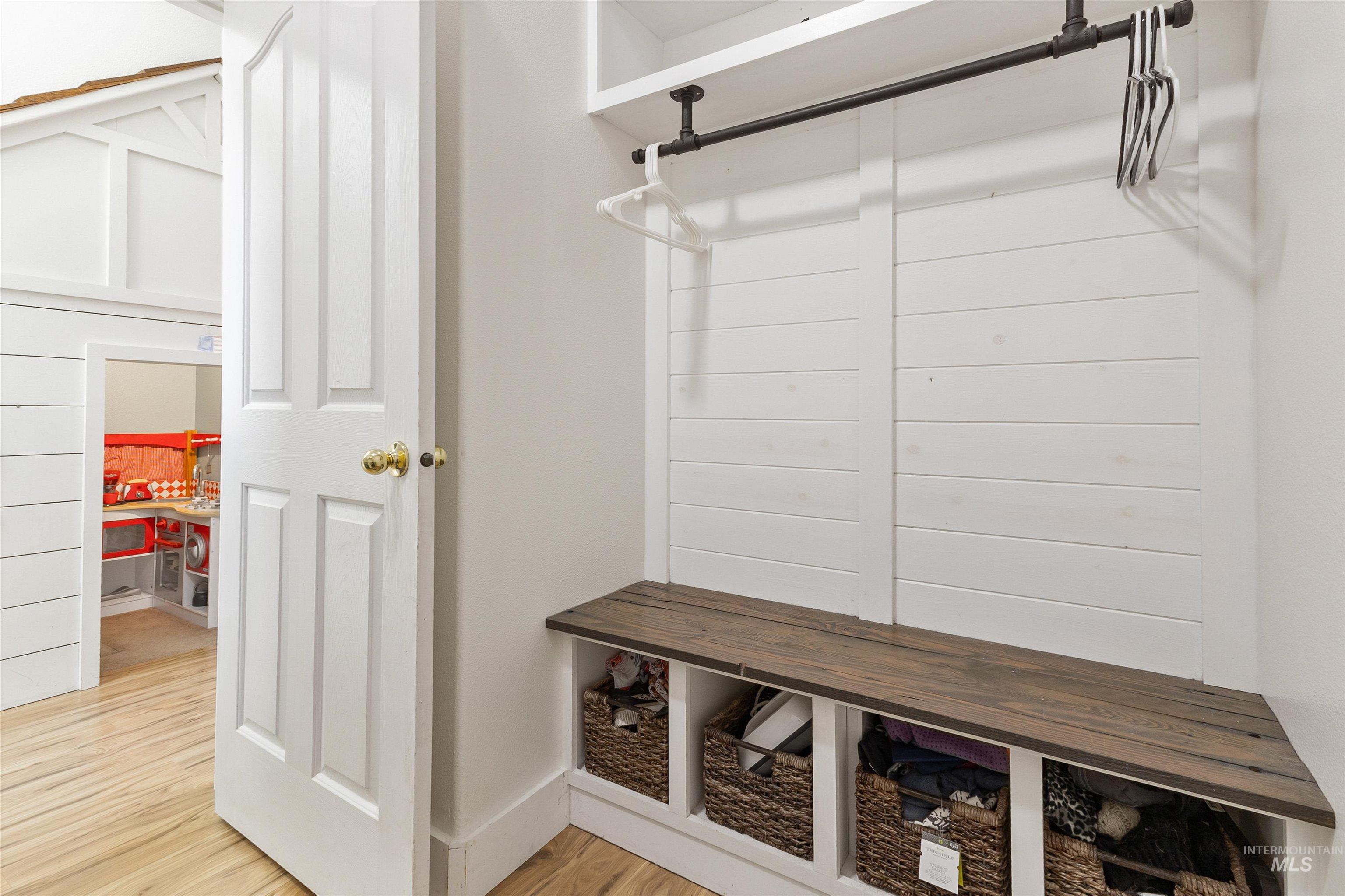 19876 Scotts Lane Caldwell, ID 83607 - Photo 31 of 44 Built-in mudroom bench with a wood-finish top and integrated cubby storage