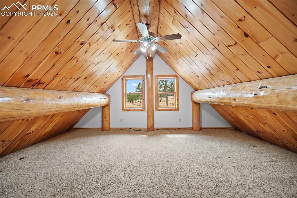 13475 South Hedi Road Sedalia, CO 80135 - Photo 18 of 28 a view of an empty room with windows