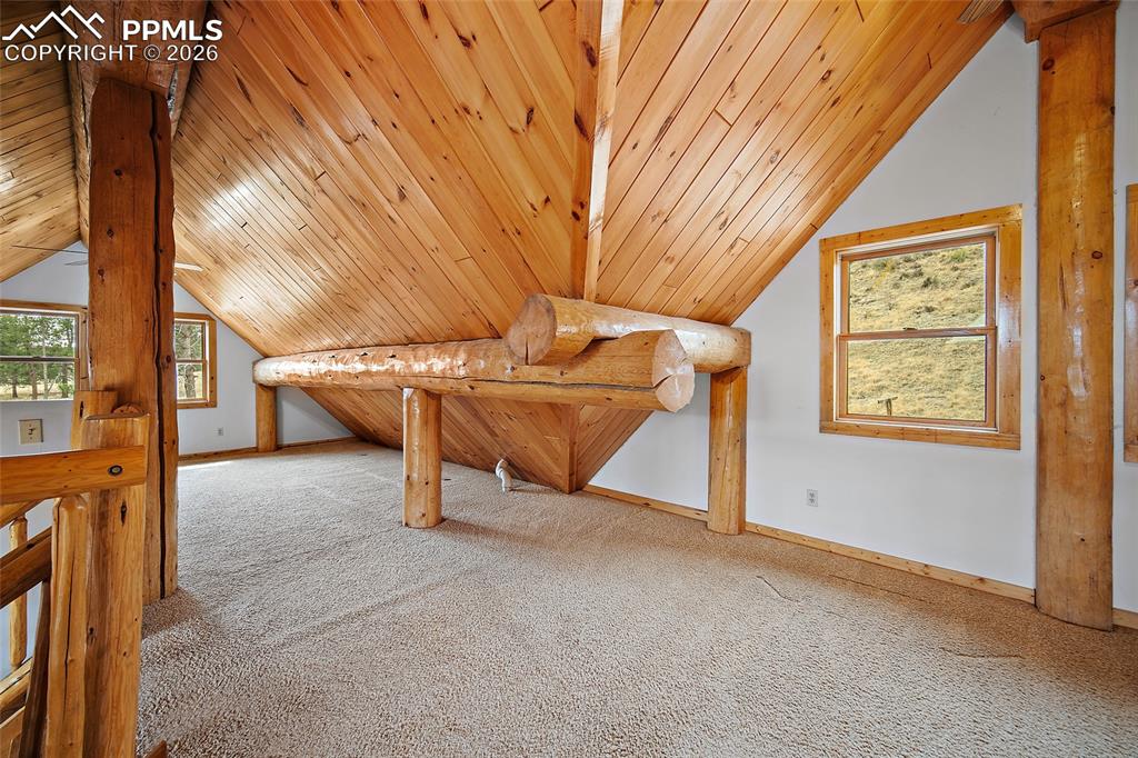 13475 South Hedi Road Sedalia, CO 80135 - Photo 20 of 28 a view of an empty room with windows