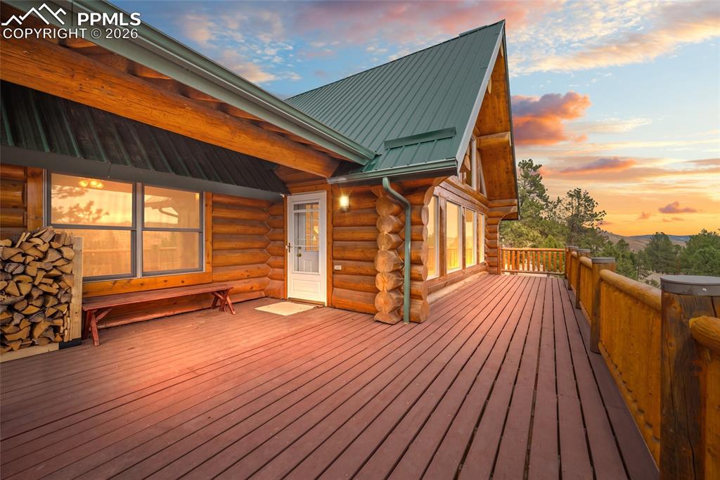 13475 South Hedi Road Sedalia, CO 80135 - Photo 26 of 28 a view of outdoor space with wooden floor and stairs