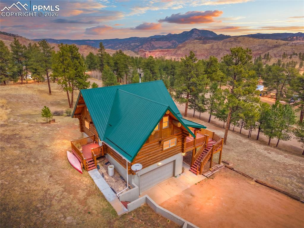 13475 South Hedi Road Sedalia, CO 80135 - Photo 27 of 28 an aerial view of a house with a yard