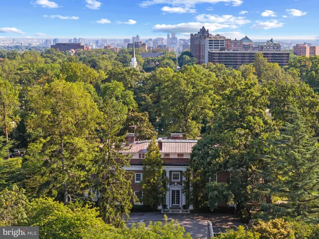 a view of a livingroom with furniture and a window