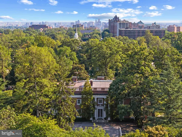 a view of a livingroom with furniture and a window
