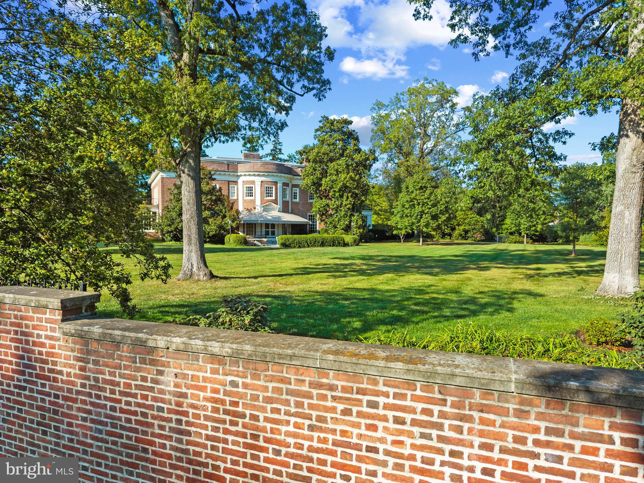 15 Charlcote Place Baltimore, MD 21218 - Photo 19 of 68 a front view of a house with a yard