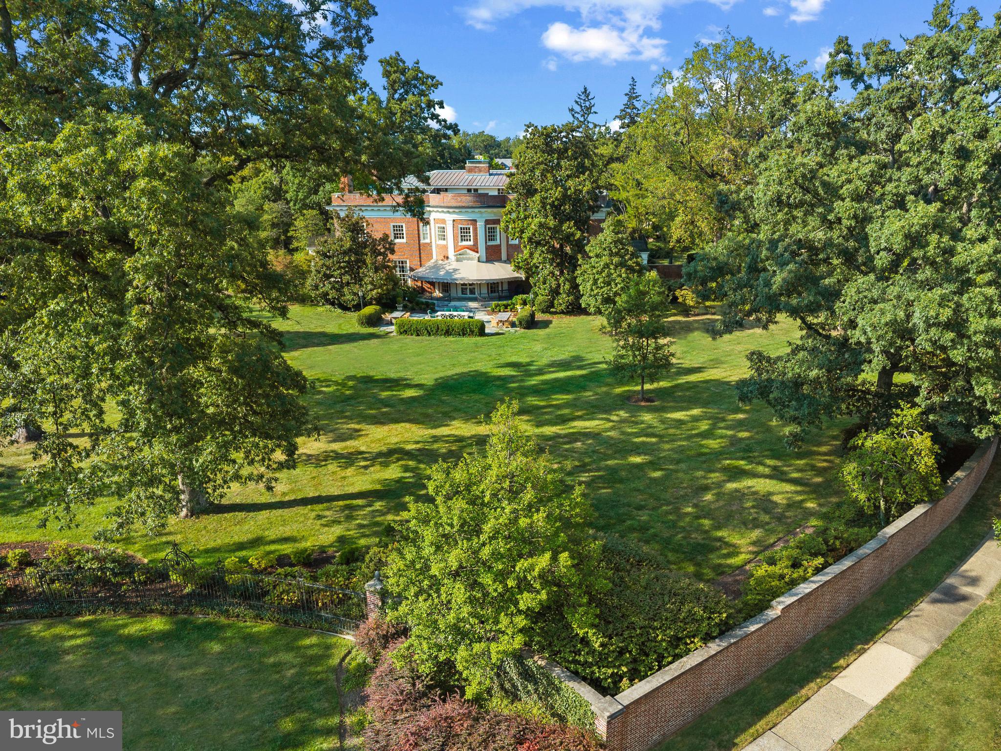 15 Charlcote Place Baltimore, MD 21218 - Photo 23 of 68 a yellow building with trees in the background