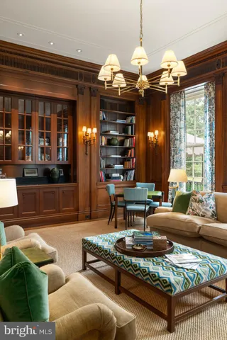 a view of a house and a table and chairs