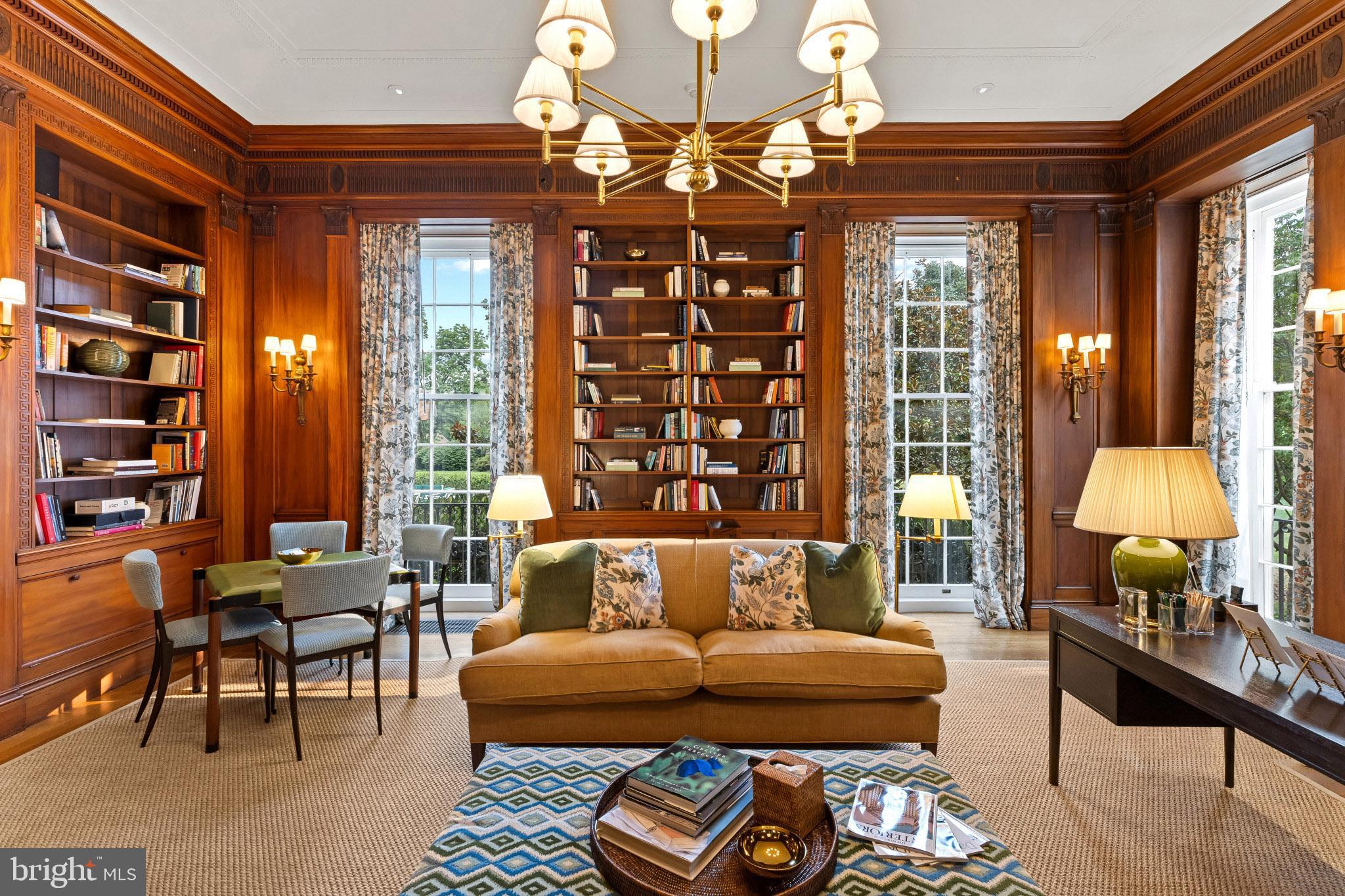 15 Charlcote Place Baltimore, MD 21218 - Photo 37 of 68 a living room with furniture and a chandelier