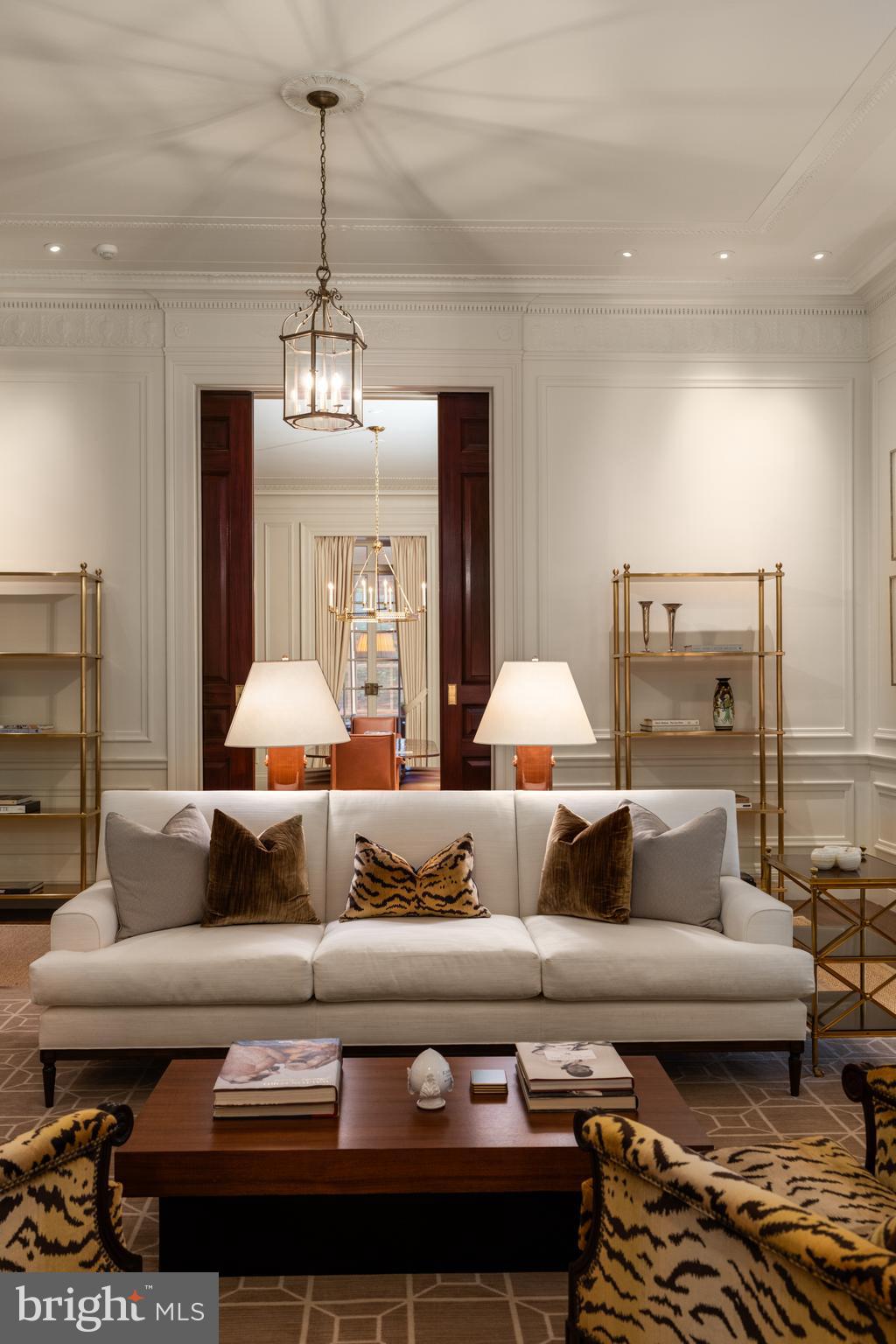 15 Charlcote Place Baltimore, MD 21218 - Photo 38 of 68 a living room with furniture and a chandelier