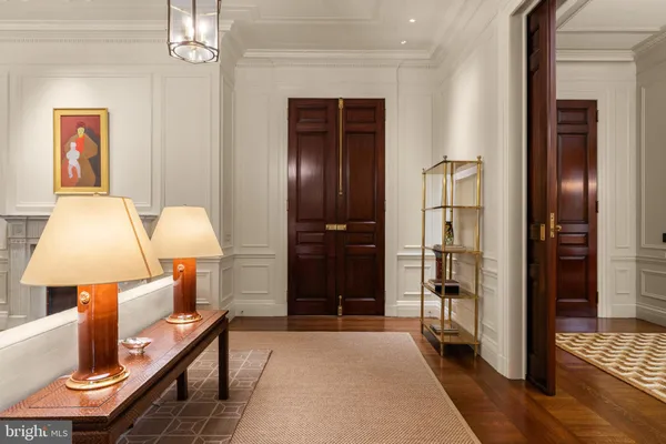a kitchen with stainless steel appliances kitchen island granite countertop a stove and a sink