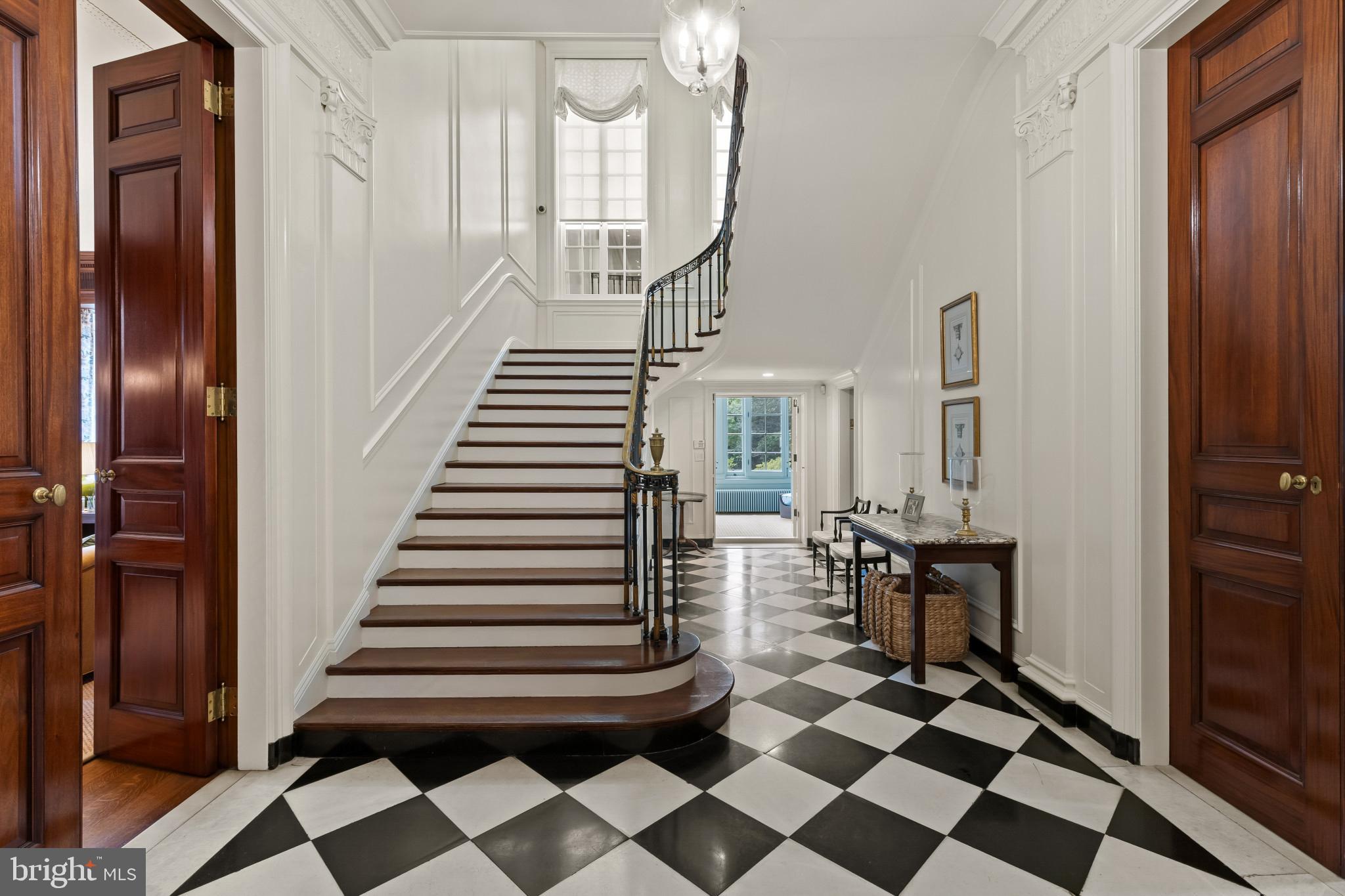 15 Charlcote Place Baltimore, MD 21218 - Photo 50 of 68 a room with lots of white walls and glass windows