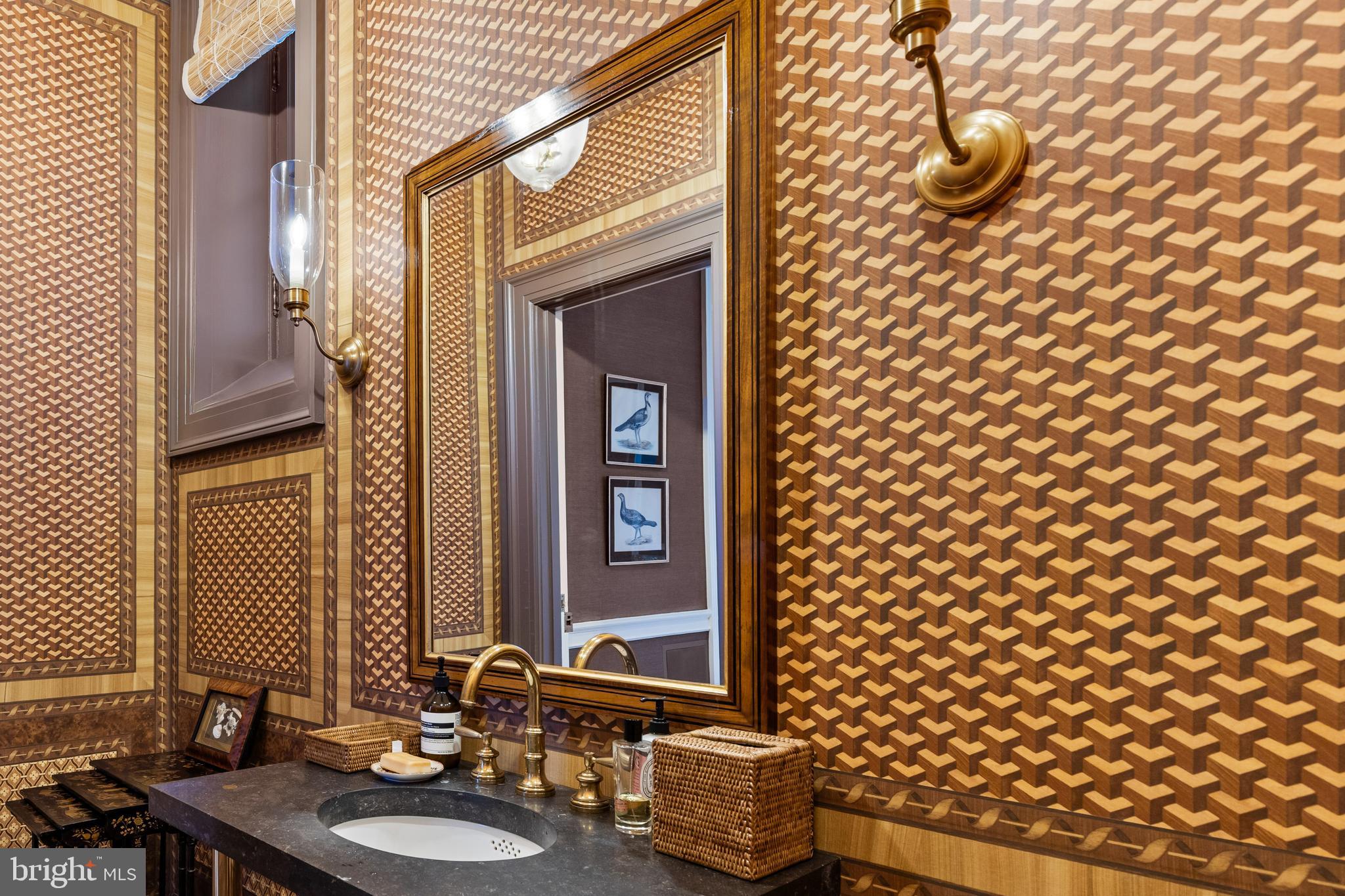 15 Charlcote Place Baltimore, MD 21218 - Photo 61 of 68 a bathroom with a sink and a mirror