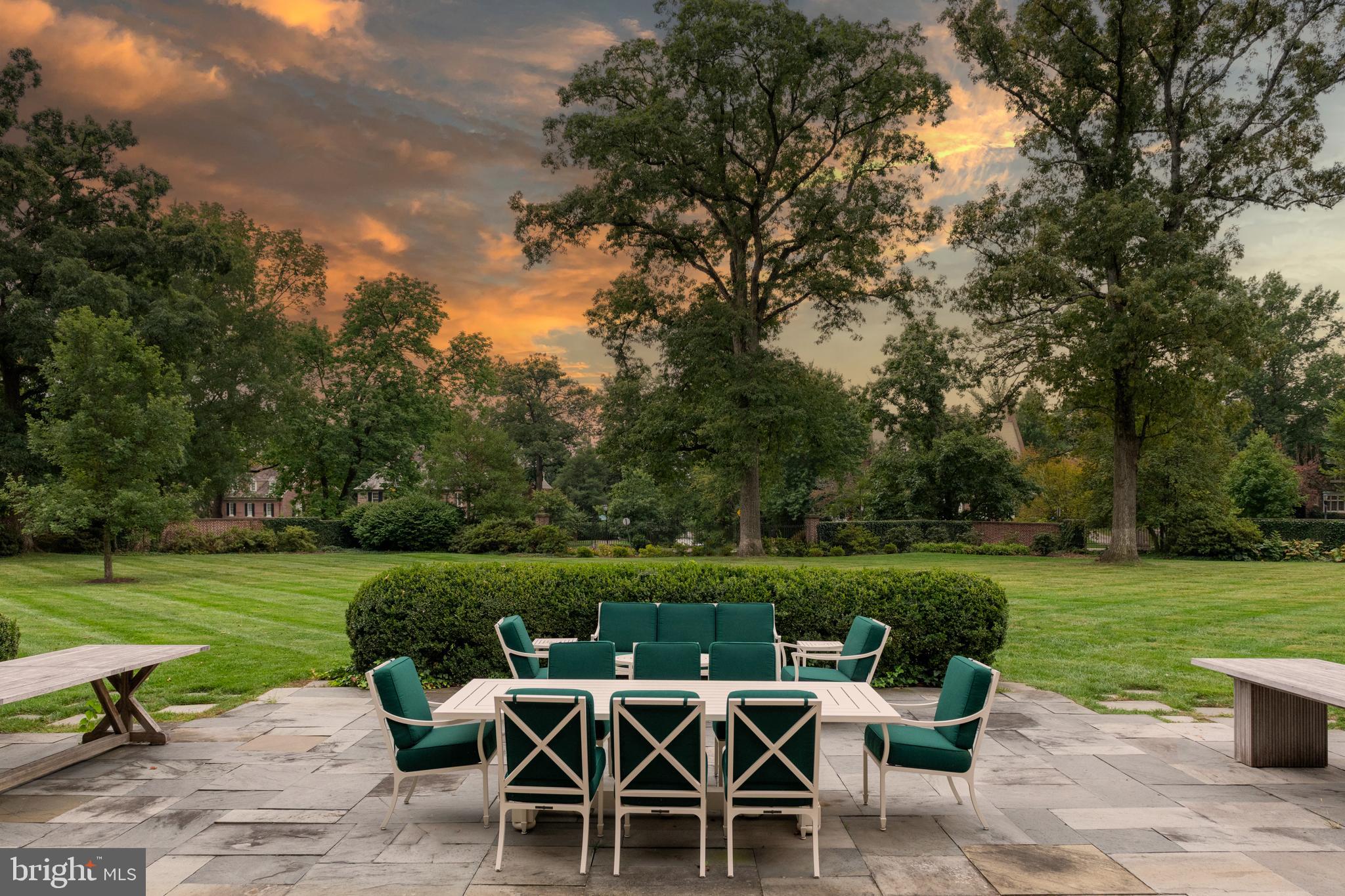 15 Charlcote Place Baltimore, MD 21218 - Photo 7 of 68 a view of a table and chairs in backyard of the house