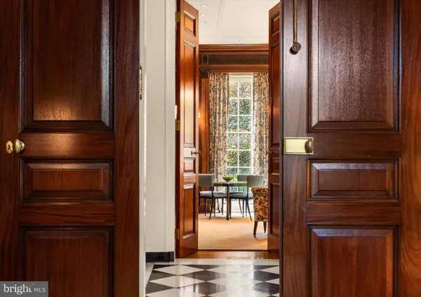 a view of a house with backyard sitting area and garden