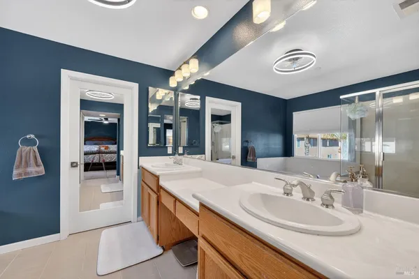 a bathroom with a tub and a window