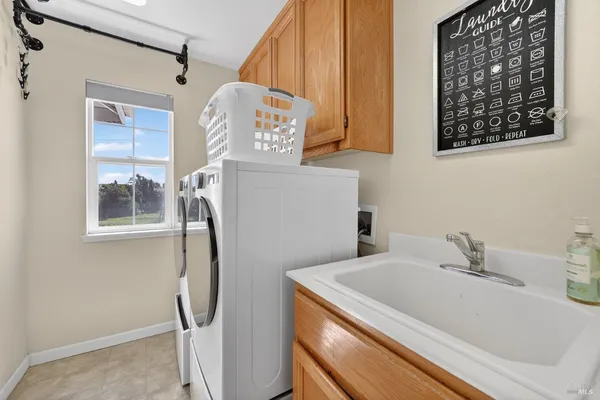 a view of a kitchen with electric appliances