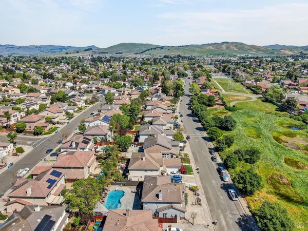 an aerial view of a house with a outdoor space