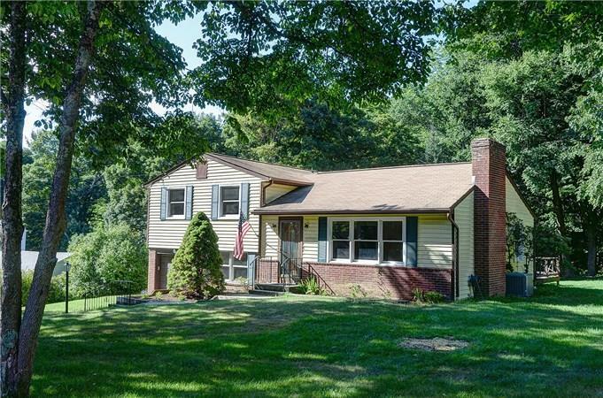 10 Silvermine Road Brookfield, CT 06804 - Photo 1 of 1 a front view of a house with a yard and green space