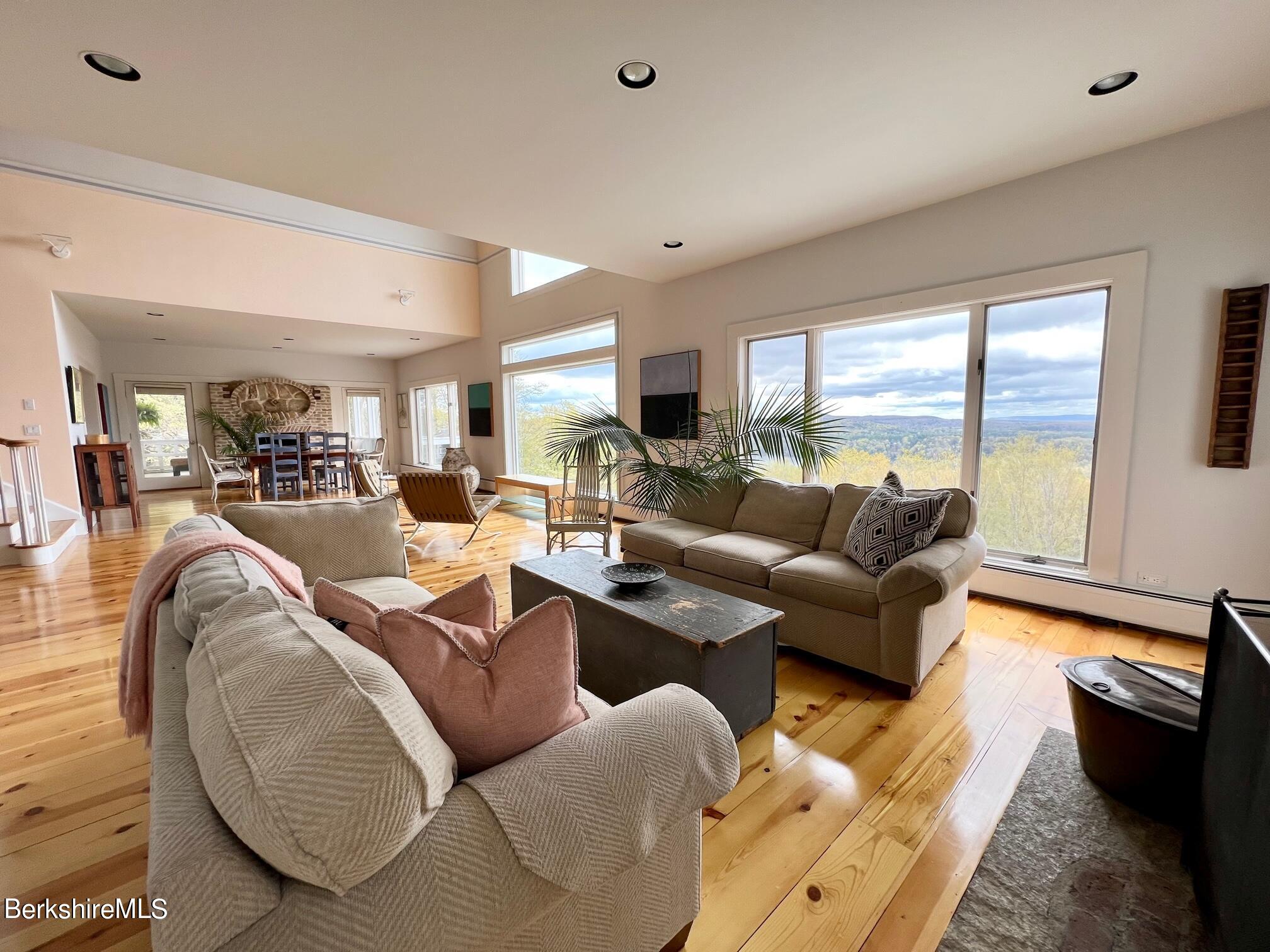 169 Mt Hunger Road Monterey, MA 01245 - Photo 17 of 51 a living room with furniture and a large window